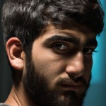 یک پسر خوشتیپ ایرانی بدون ریش و با قد بلند و موهای قهوه ای