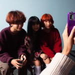 Taehyung, Jungkook and Ella Gross sit together and take pictures