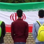 پرچم ایران در کنار دانش اموزان