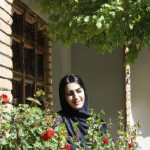 An Iranian woman in the garden