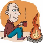 یه مرد که جلوی آتیش نشسته و داره چایی میخوره
